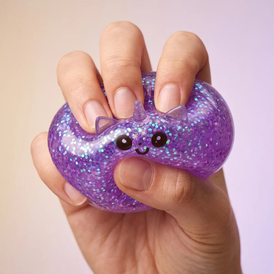 Purple unicorn dumpling squishy slow rise after squeeze