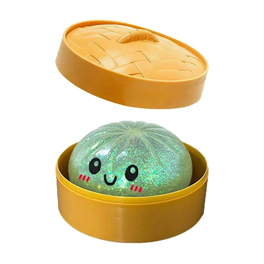 Green glitter dumpling squishy in steamer box